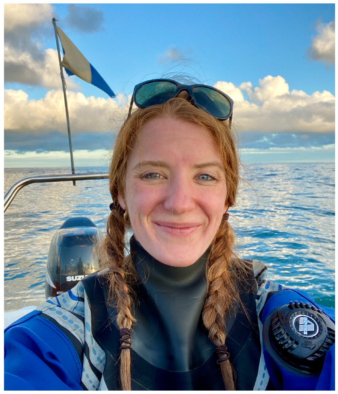 A head and shoulders shot of Libby Keatley on a boat in diving gear